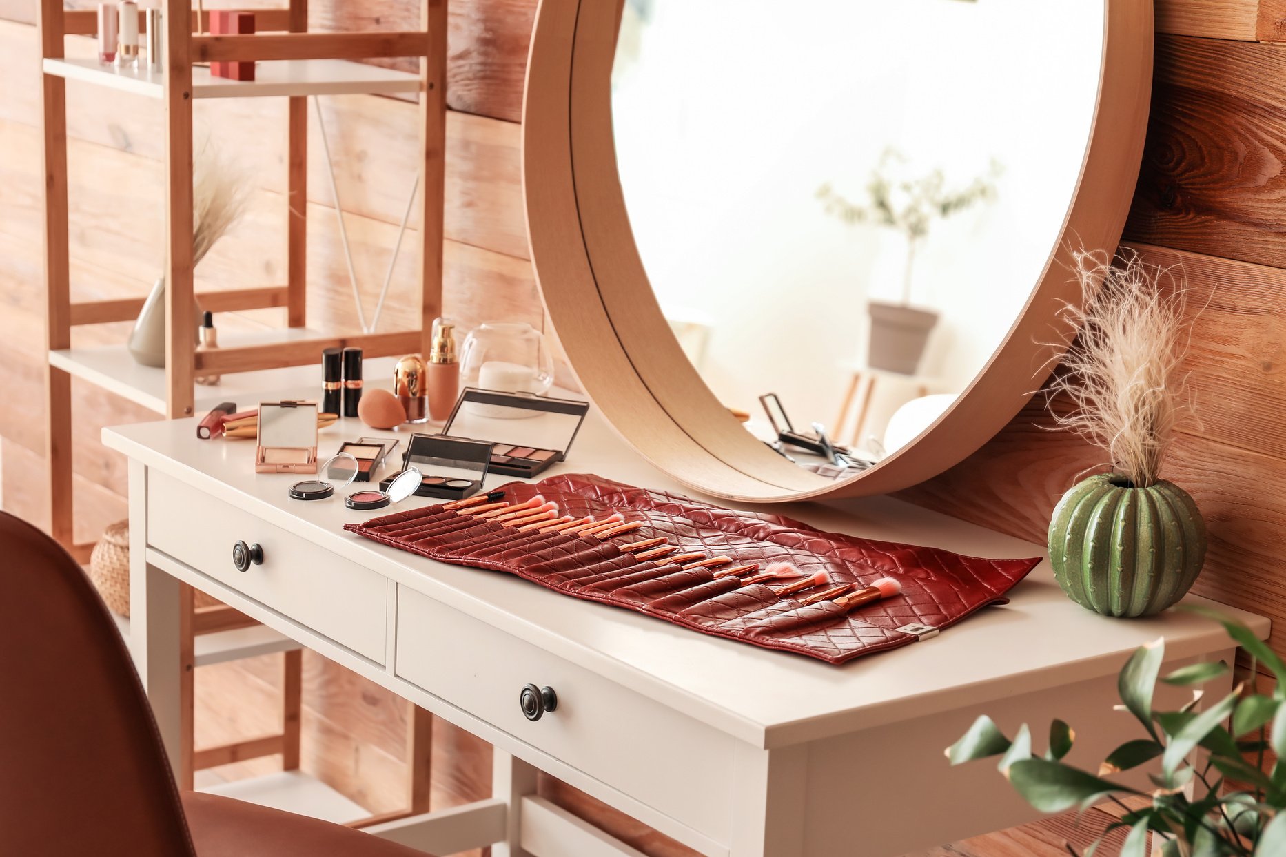 Table of Makeup Artist with Brushes on Table